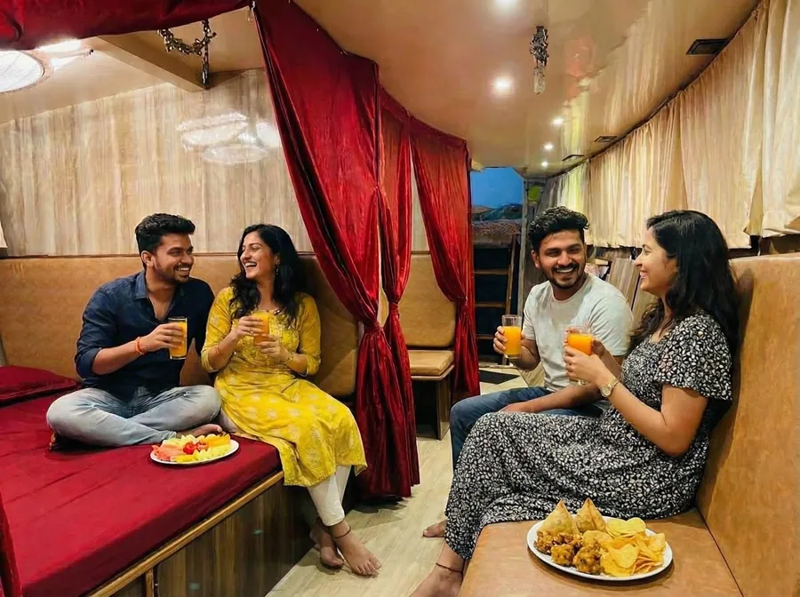 Guests relaxing in the onboard lounge of the Max Adventures houseboat